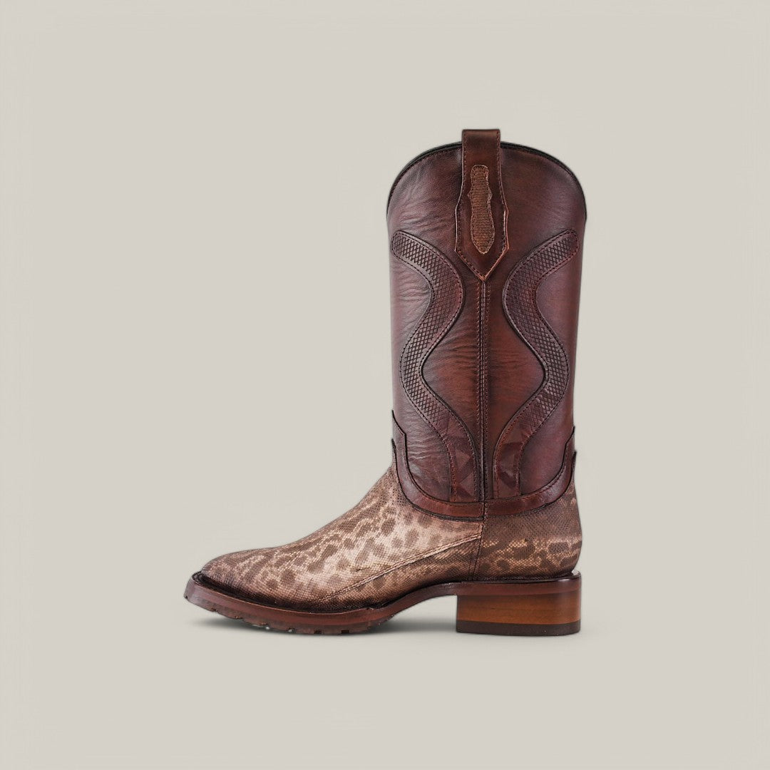 The Exotic Carunga boot, named Diamond Natural, is displayed against a plain background. Made from rich brown exotic leather, it features a high shaft with intricate stitching, a double sole square toe, and embodies Western craftsmanship with its low heel.