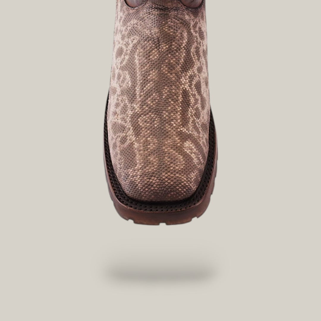 Close-up of a brown Exotic Carunga - Diamond boot with a reptile-like pattern upper, showcasing Western craftsmanship with a square toe and double dark sole against a light background.