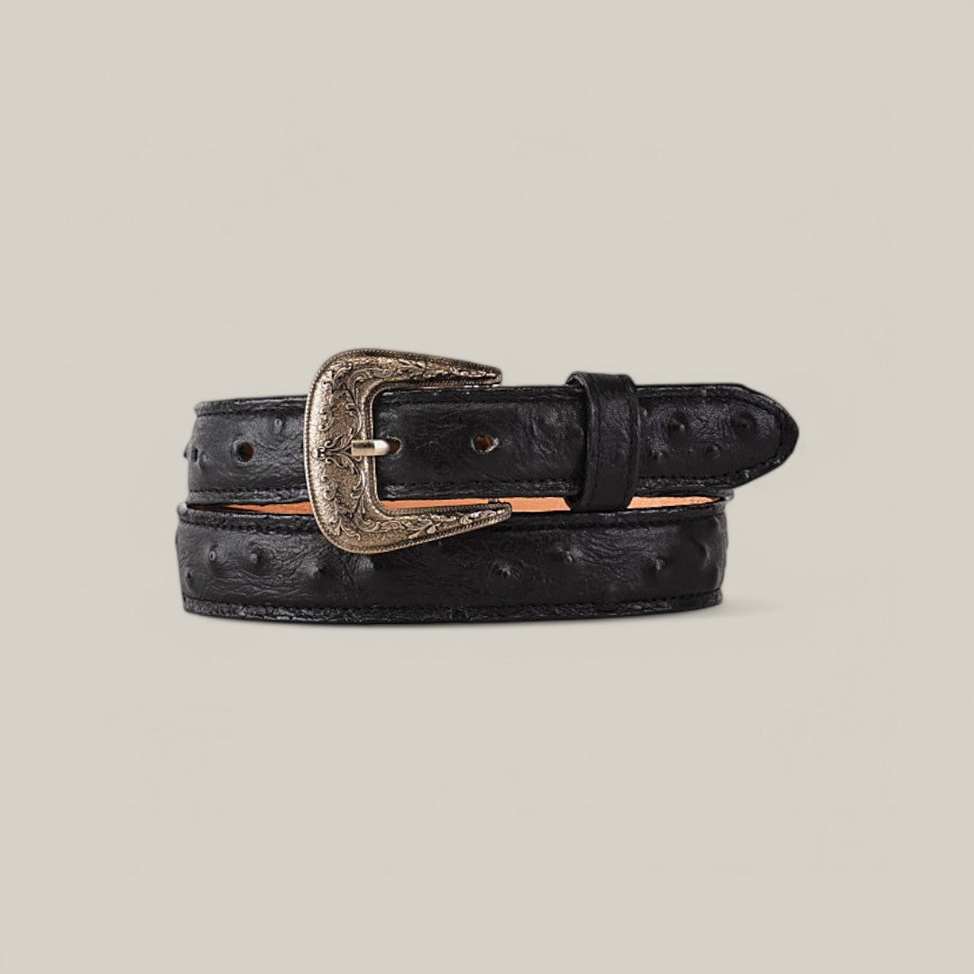 The Ostrich Print Black Belt for kids, featuring a Texas buckle with intricate engravings and an embossed texture, is coiled neatly against a light gray background.