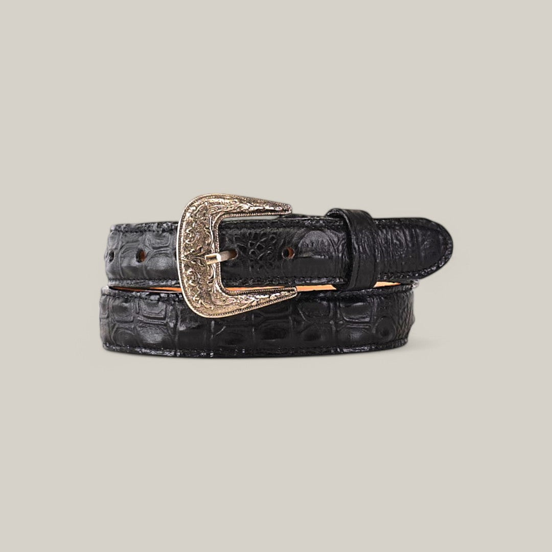 The Caiman Print Black Belt - Texas Buckle for kids, made from textured leather with a stylish gold buckle, lies on a light gray background. This striking piece enhances any young trendsetters look with its intricate patterns.