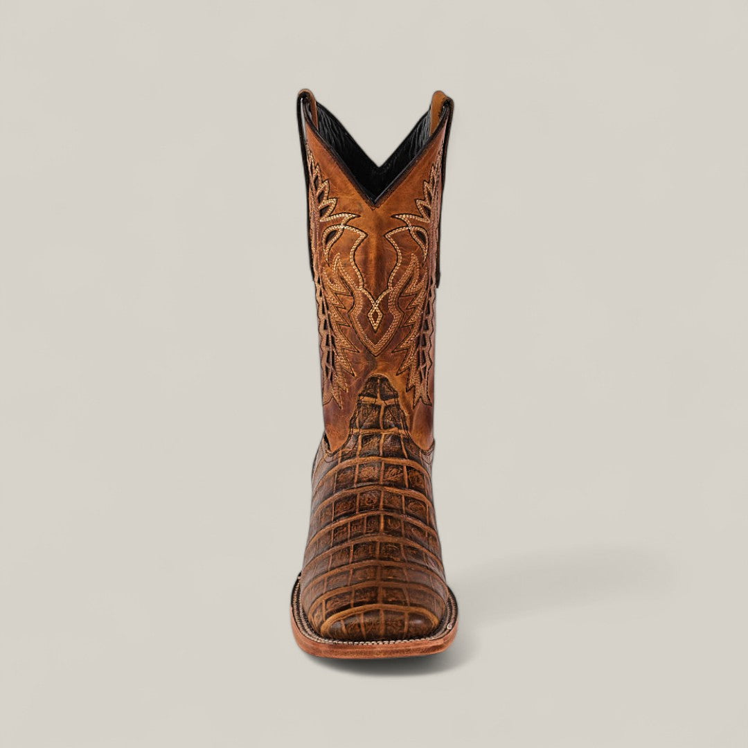 The Ross - Orix - Square Toe is a single brown cowhide boot featuring quality craftsmanship, decorative stitching on the shaft, and a textured alligator-style pattern, shown against a plain light background.