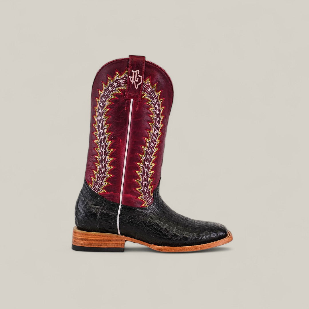The Exotic Caiman Horn Back - Black - Square Toe showcases a textured black lower, wooden sole, tall burgundy upper with yellow and white stitching, and square toe. Set against a plain light gray background.