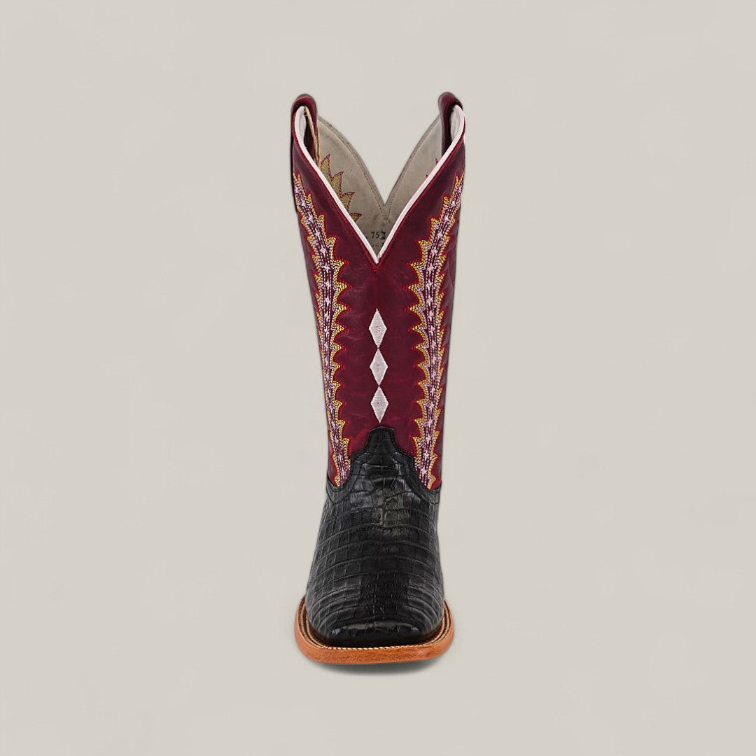 Front view of the Exotic Caiman Horn Back - Black - Square Toe boot, featuring a black textured caiman toe, brown sole, and a tall maroon shaft with multicolored embroidery and white diamond-shaped accents.