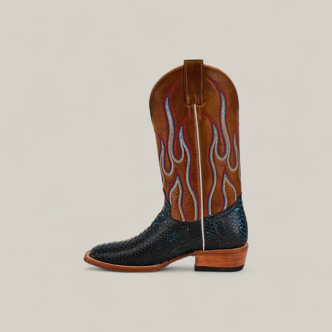 The Exotic Python - Dark Blue - Square Toe boot features a brown upper with red and white flame-like stitching, a black textured lower like python skin, and a classic square toe, set against a plain light background.