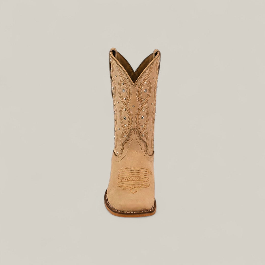 The Premiere Suede Bone - Square Toe - Kids boots feature tan suede, decorative stitching, and small silver studs, displayed upright and facing forward against a plain light background.