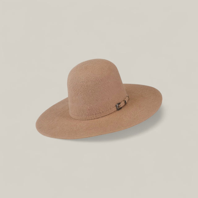 The 25X Grizzly - Belly - TC Hats features a wide, beige open crown felt with a rounded crown and a small decorative band with a buckle on the side, shown against a simple light background.
