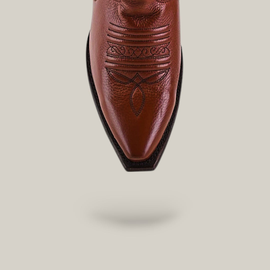 The Marjorie Star Brown - Tall Shaft - Snip Toe boot is displayed from above, highlighting its brown leather, snip toe, and decorative stitching on a light beige background with a subtle shadow.