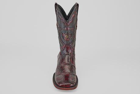 A single Exotic Alligator - BlackCherry- Square Toe cowboy boot with detailed stitching and an embossed crest, shown facing forward on a plain white background.