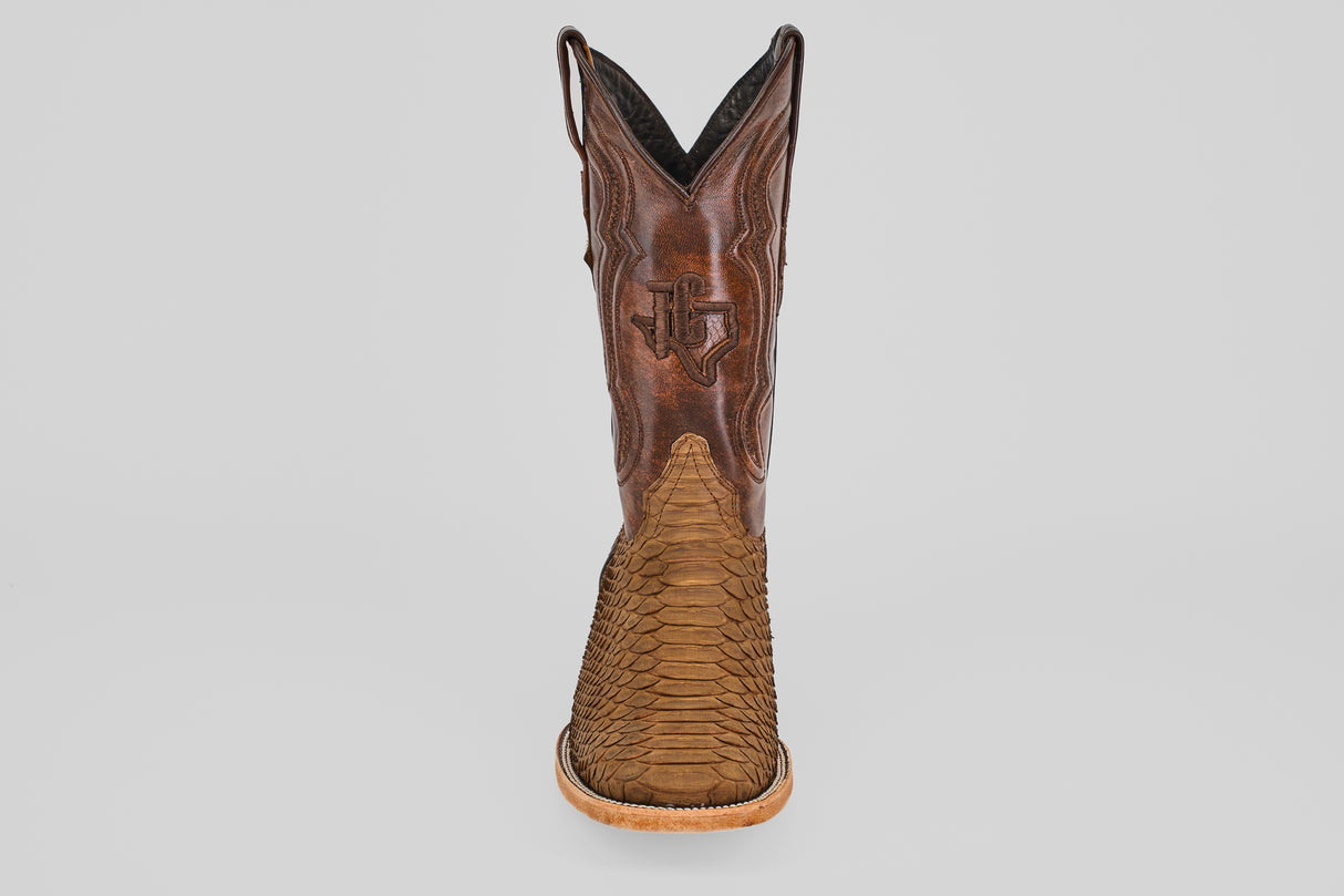 The Tanner - Tamarindo - Square Toe boot, made from Python Tamarindo leather with scale-like texture on the lower part and stitched designs on the shaft, is shown from the back against a plain white background.