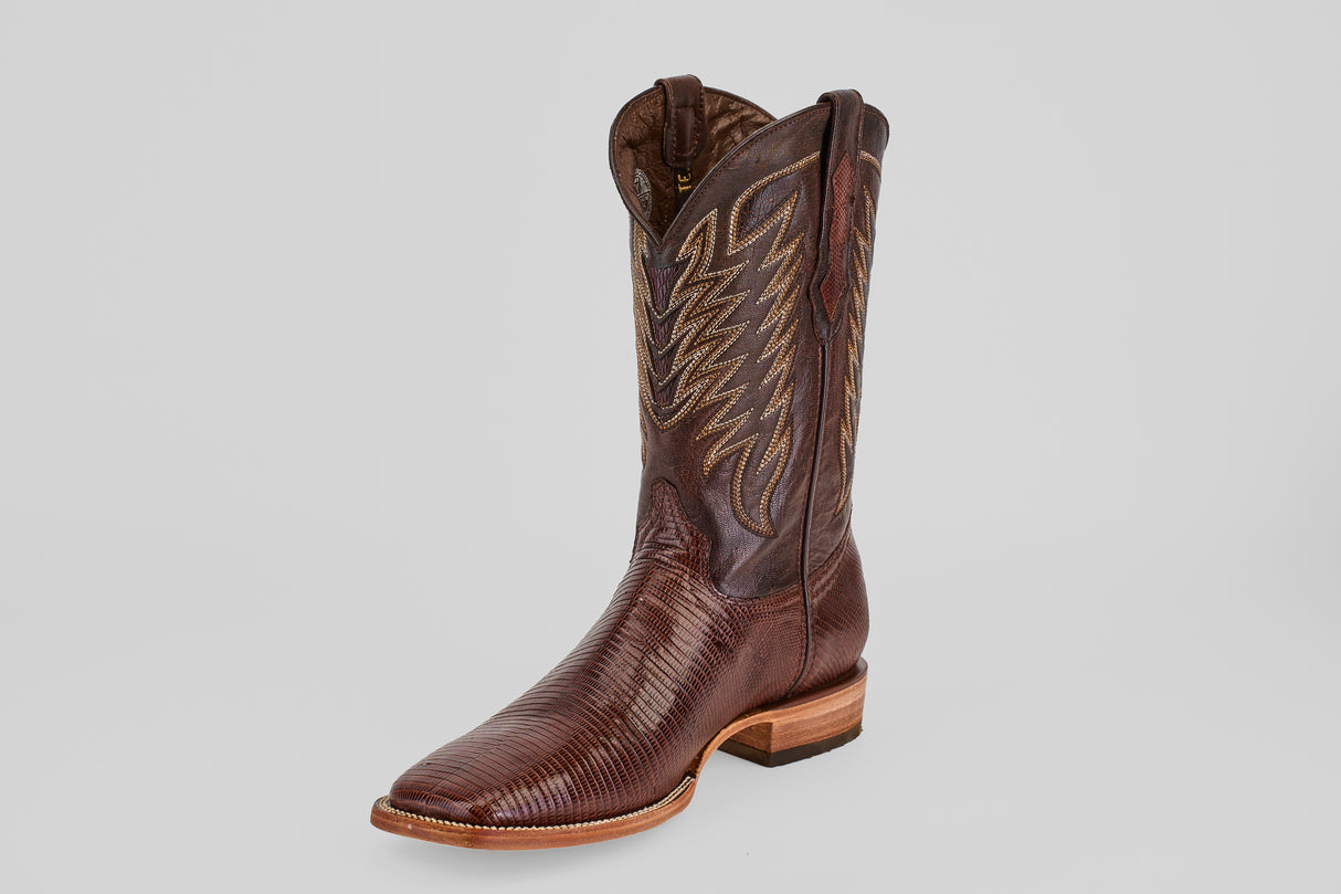 The Blaze – Brown – Square Toe Cowboy Boot, featuring decorative stitching, a square toe, and a low wooden heel, is displayed against a plain light gray background.