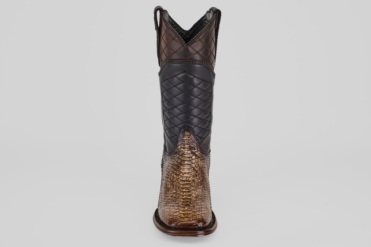 The Tanner Platinum - Dune - Square Toe (Imperial) is a men's cowboy boot featuring a patterned dark upper and textured brown python-like lower, shown from the front on a plain light background.