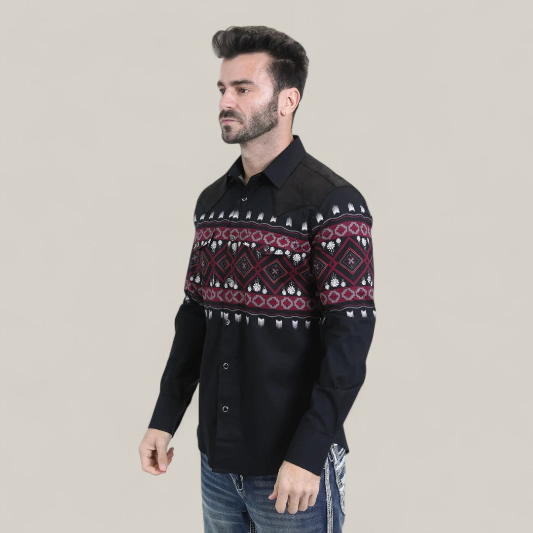 A man wears the Mens Western Modern Fit Cotton/Spandex Long Sleeve Black Shirt with Snaps (WPL10750) and blue jeans, standing against a plain light beige background.