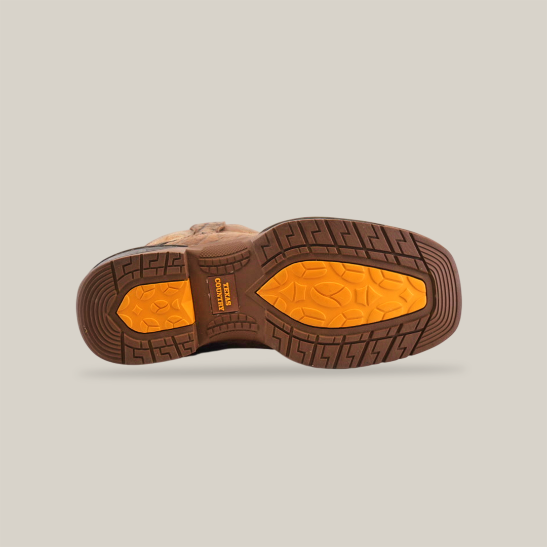 The Tan Brown Rough out Waterproof Soft Toe boot is showcased from below, featuring a textured sole with yellow accents and embossed patterns for traction. Made from premium cowhide leather, it embodies handcrafted excellence against a plain white backdrop.