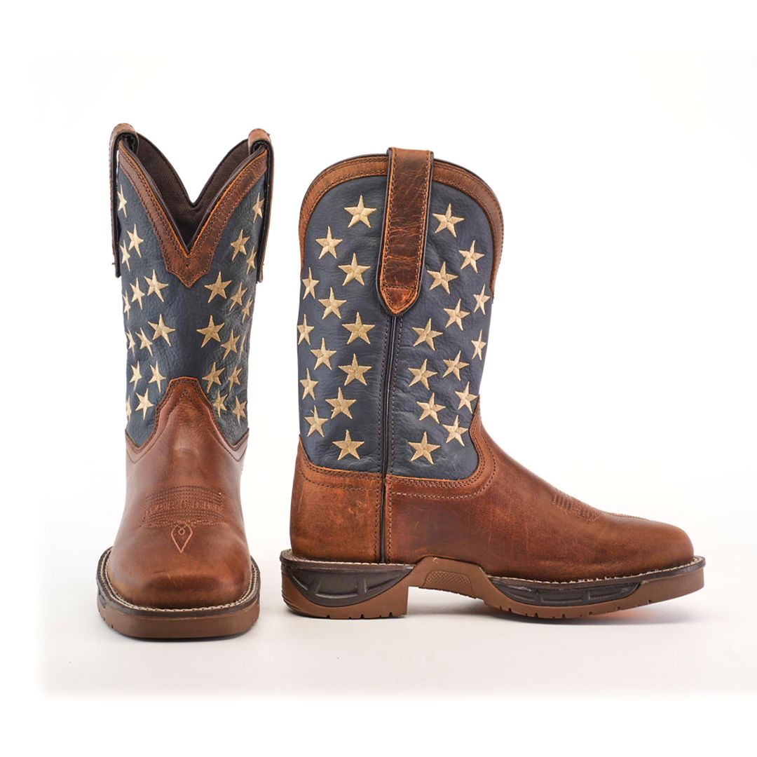 Navy Brown US Flag Waterproof Soft Toe cowboy boots feature premium cowhide leather with brown and navy shafts adorned with white stars. One boot shows a front view and the other a side view, highlighting the star design and pull straps. Rugged soles ensure water-resistant durability for any adventure.