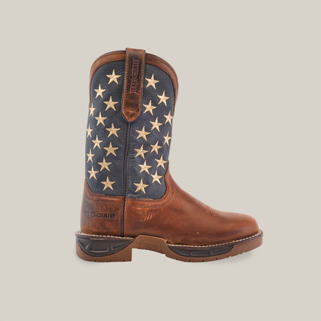 The Navy Brown US Flag Waterproof - Composite Toe cowboy boot blends durable construction with premium cowhide leather. It boasts a dark blue shaft with white embroidered stars, Texas Country on the heel, and features a sturdy sole for lasting wear.