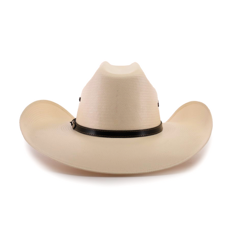 The 500X Bull Straw Hat embodies Western elegance with its cream color, wide brim, and tall pinched crown. Accented by a genuine leather band at the crowns base, it rests gracefully on a plain white background.