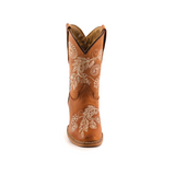 The Rama Honey Snip Toe cowboy boot showcases a genuine leather design with white floral embroidery on the brown shaft, featuring a classic pointed toe and low heel, complemented by stylish stitched detailing along the sides.