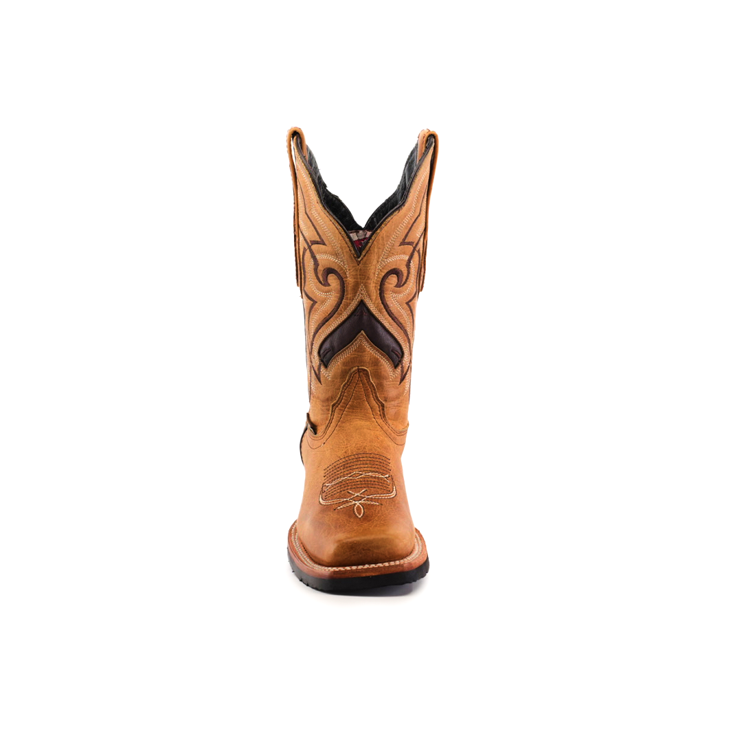 The Wild Mustard Slip Resistant Sole Rodeo Toe is a premium brown cowboy boot made of cowhide leather, showcased against a white background. It has intricate stitching, dark upper accents, and a slip-resistant sole for enhanced safety and style.