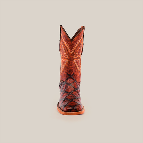 Front view of the Big Bass Pirarucu Print Cogñac cowboy boot with a square toe, highlighting detailed stitched patterns on the shaft against a plain white backdrop.