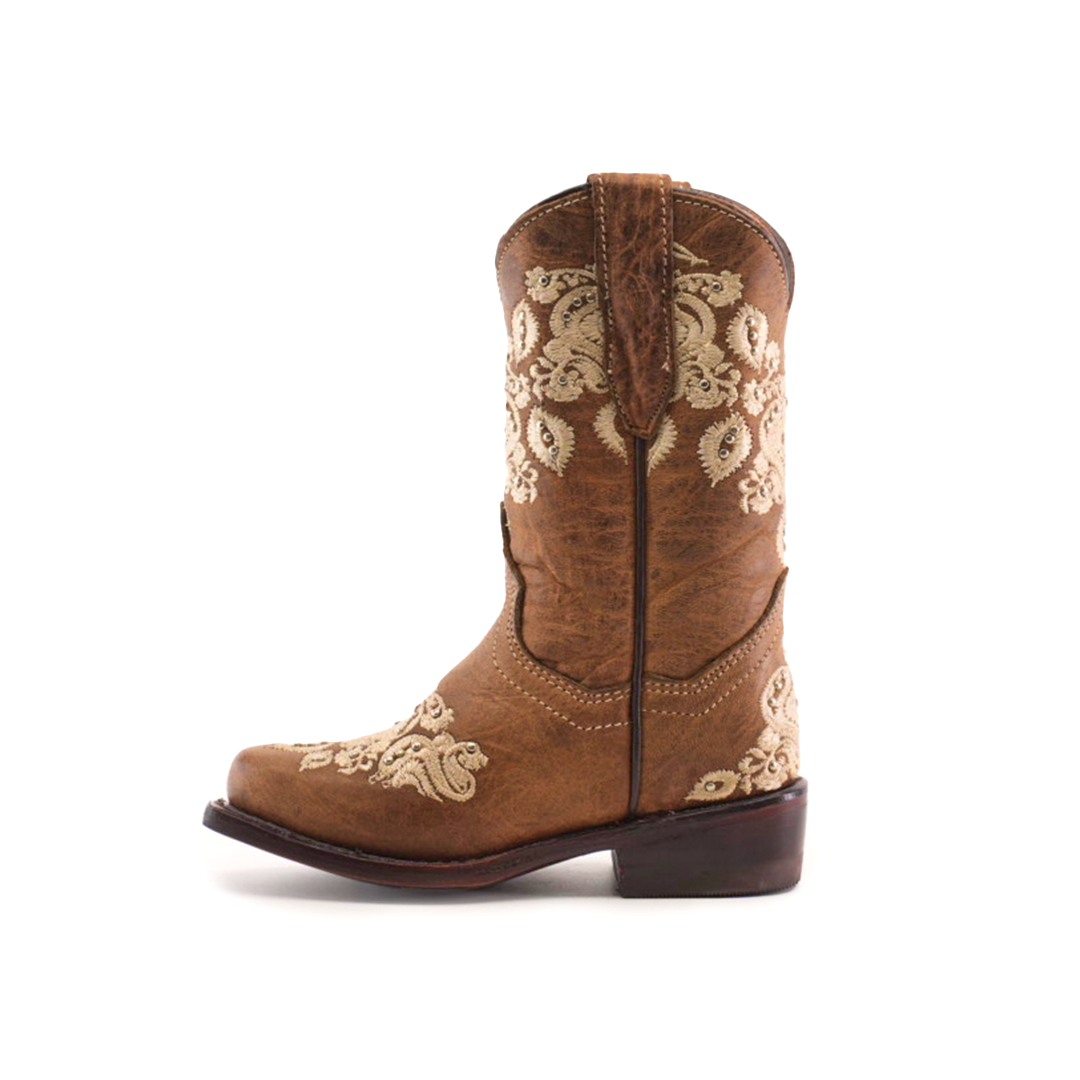 The Martey Crystals Sahara - Snip Toe cowboy boot is brown with intricate white embroidery. It features Martey Crystals accentuating floral patterns, has a snip toe design, low heel, and a convenient side pull tab.