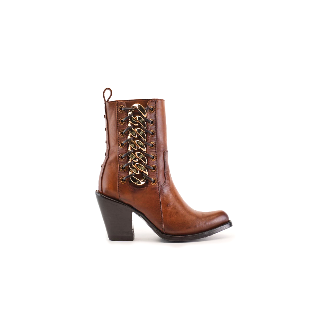 The Francia Rings Bootie Tan - J Toe from the Platinum Collection features luxurious leather in a brown ankle boot with gold lacing, a back loop, chunky high heel, and sleek polish. Presented against a simple white backdrop.