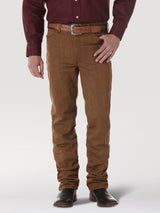 A person wearing a burgundy shirt and brown pants accessorized with a brown belt and dark brown shoes stands against a neutral background. The outfit highlights Wrangler Cowboy Cut Slim Fit Jean - 100936BKW for a relaxed fit, exuding effortless style and casual elegance.