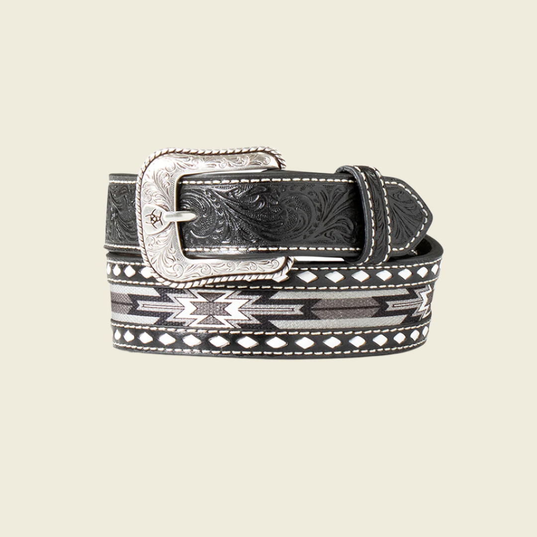 The Ariat Western Boys Belt (A1308101) features a black leather design with intricate silver buckle details and decorative white stitching. It boasts a geometric pattern in gray and black for a stylish, textured, Western-inspired look.