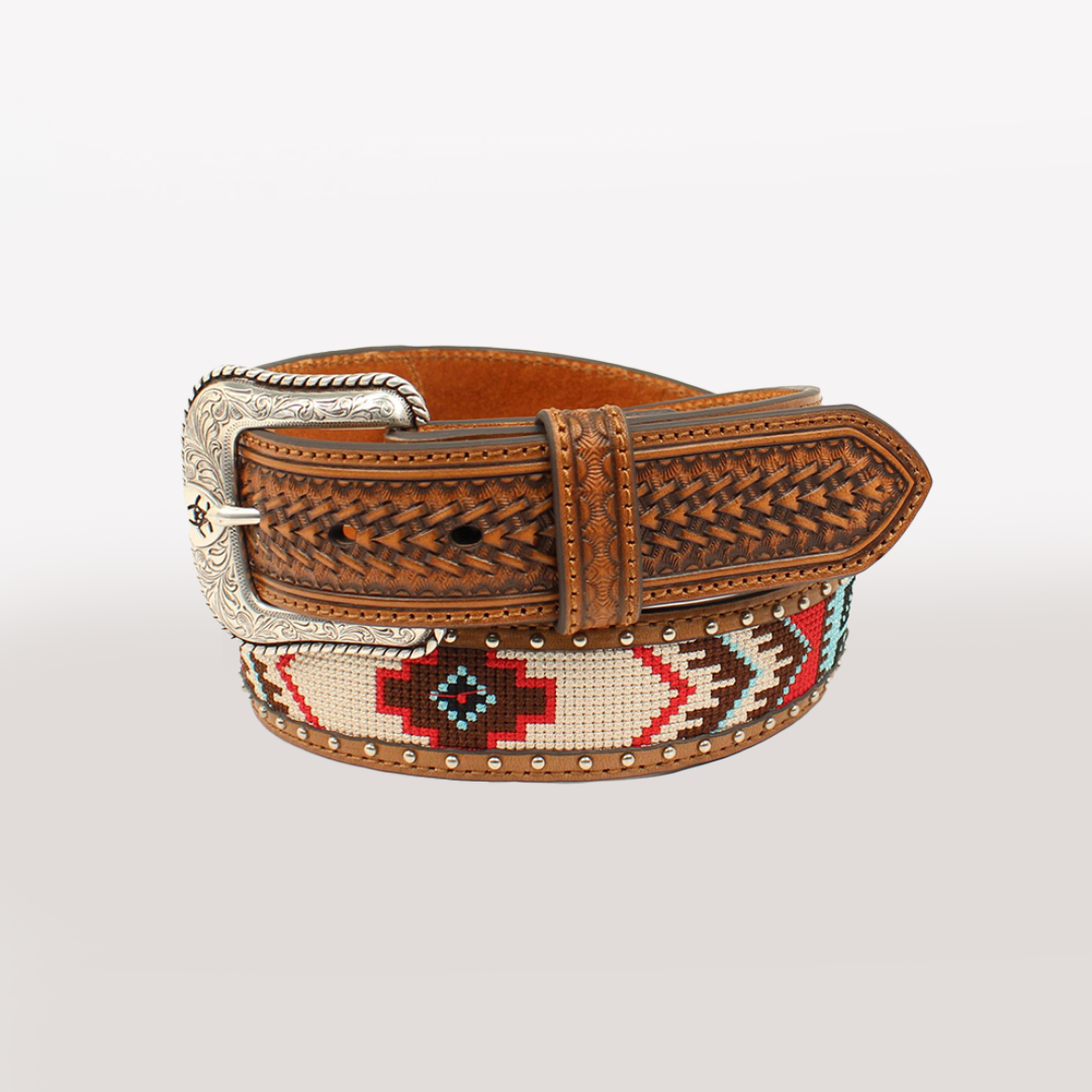 Experience rugged elegance with the Ariat Mens Brown Basketweave Western Belt (A1033297), featuring a decorative silver buckle, red, black, and turquoise Aztec beaded patterns, textured leather accents, and metal studs—perfect for embracing Western heritage.