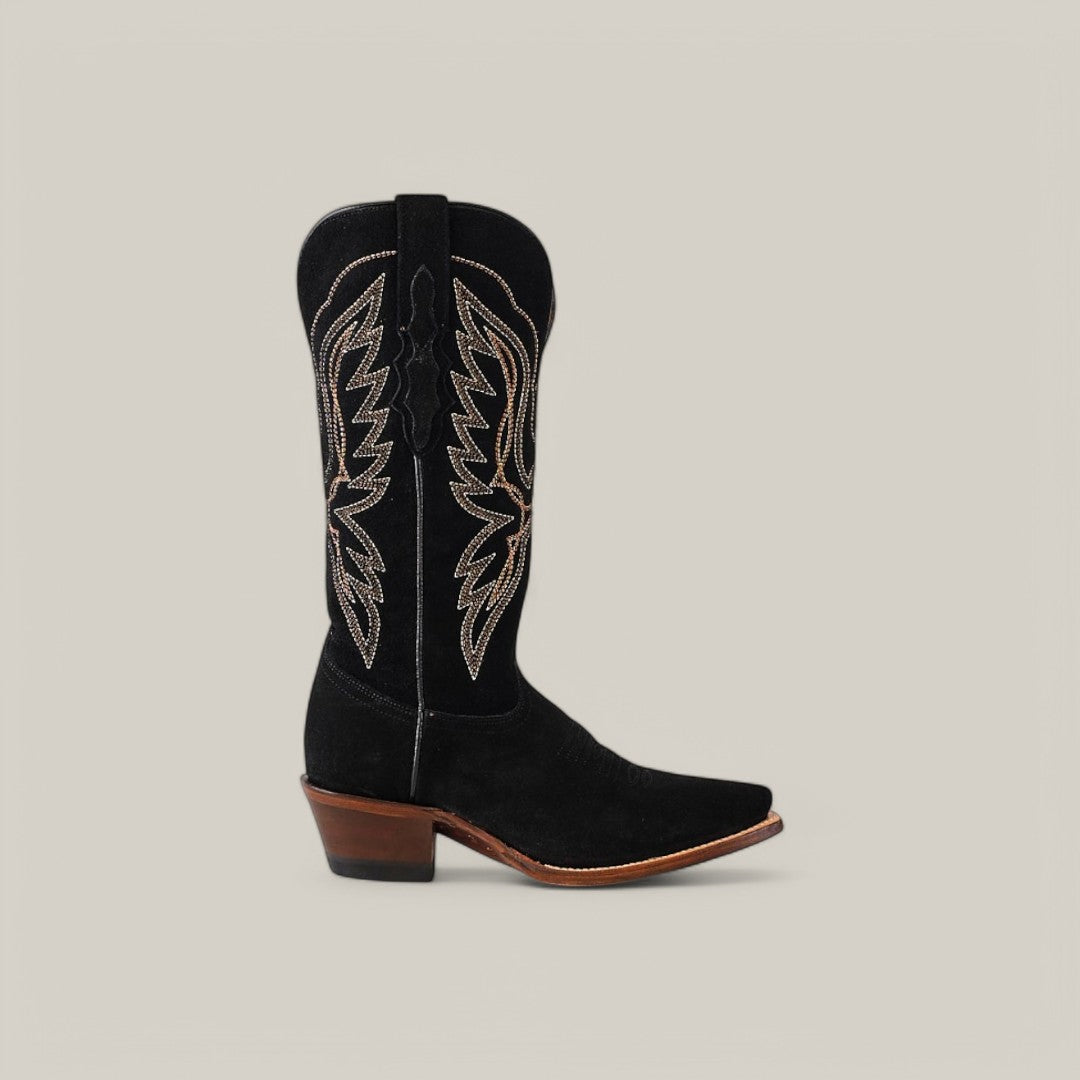 The Miranda Suede Black Leather Sole boot features a snip toe, mid shaft with intricate beige stitching against a black backdrop, complemented by a wooden heel, crafting an effortlessly chic look.