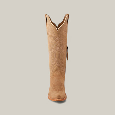 The Kellie Suede Fawn boots boast a tan cowboy style with intricate stitching and a chic snip toe, displayed upright against a plain backdrop, polished off with a premium leather sole.