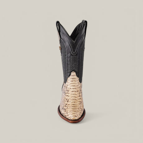 The Exotic Python - Natural - Snip Toe cowboy boot features a black and light-colored python leather design with intricate stitching, displayed elegantly on a plain gray background.