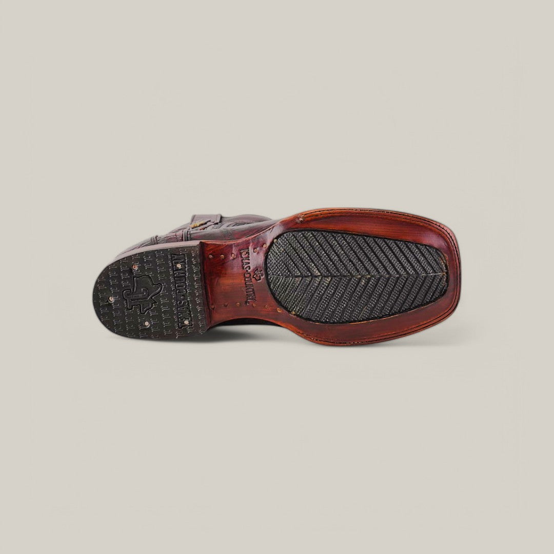 The image showcases the Exotic American Alligator Belly shoe in black cherry, featuring a brown leather sole with a textured black rubber insert for grip. Intricate stitching and a visible logo add distinctive style, while the square toe design enhances its aesthetic appeal and functional elegance.