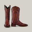 The Exotic American Alligator - Herradura - Brandy - Square Toe boots feature a crocodile pattern, detailed stitching, a high shaft, and sturdy heel, showcasing their exotic charm against a plain background.