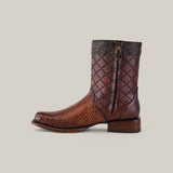 The Exotic American Alligator boot in Europe Fawn offers a refined style with mixed crocodile and grid textures. Made from premium alligator leather, it showcases ornate stitching, side zippers, a low heel, and a round toe for effortless elegance in rich brown.