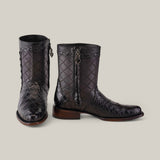 The Exotic American Alligator - Europe Black boots feature a quilted pattern and decorative stitching on premium alligator leather. They include a side zipper with chain pull, brown sole, and black color.