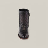 The Exotic American Alligator boot in Europe Black features a quilted texture and detailed stitching with a side zipper and decorative metal accents. This European design showcases a round toe and low heel, set against a plain grey background.