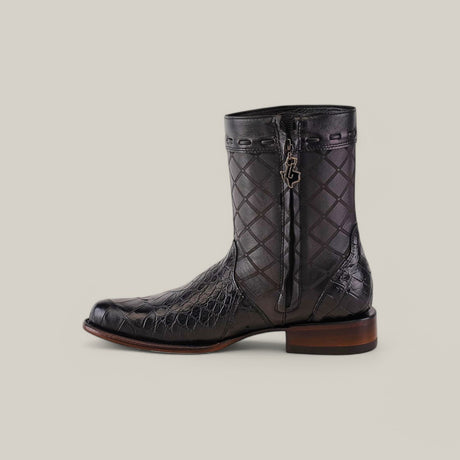 The Exotic American Alligator - Europe Black - Round Toe boot showcases a black leather design with crocodile pattern, diamond stitching, and a side zipper. It features a low wooden heel and star-shaped zipper pull against a light, neutral background that highlights its elegance.