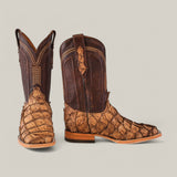 The Exotic Pirarucu Fish boots in Matte Orix feature a unique scaled pattern on the lower section reminiscent of Amazonian Pirarucu, paired with smooth leather on the upper shaft and intricate stitching.