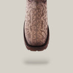 Close-up of a brown Exotic Carunga - Diamond boot with a reptile-like pattern upper, showcasing Western craftsmanship with a square toe and double dark sole against a light background.
