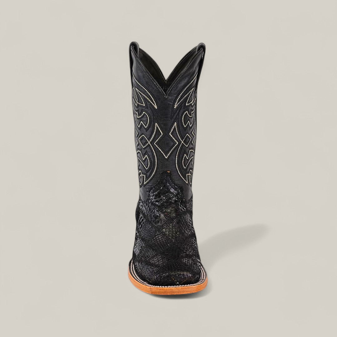 The Exotic Patchwork Python - Black - Square Toe boot features decorative stitching and a square toe, shown front-facing against a plain light gray background.