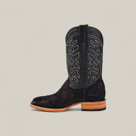 The Exotic Patchwork Python - Matte Black - Square Toe features intricate light stitching on the shaft, a square toe, and a light brown wooden heel, shown against a plain light background.