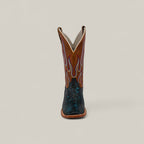 Front view of the Exotic Python - Dark Blue - Square Toe Boot from the Platinum Collection, featuring a brown upper with red and blue flame stitching and a textured dark blue python foot, set against a plain light background.