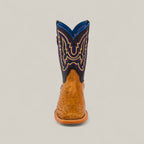 The Exotic Full Quilt Ostrich Fawn - Square Toe - Kids Boot features a fawn ostrich foot, dark blue shaft, and colorful embroidery, displayed from the front against a plain light background.