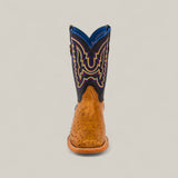 The Exotic Full Quilt Ostrich Fawn - Square Toe - Kids Boot features a fawn ostrich foot, dark blue shaft, and colorful embroidery, displayed from the front against a plain light background.