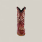 The Blake Cognac - Square Toe Kids Boot, shown from the front against a plain light background, features rich brown leather with decorative white stitching and western patterns.