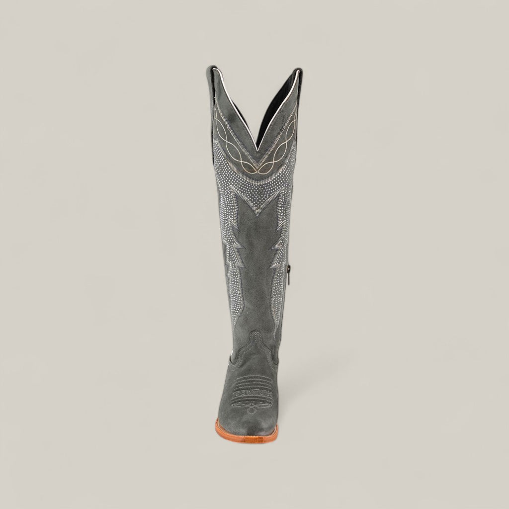 The Celine Gray - Tall Shaft - Snip Toe women’s black leather cowboy boot features white decorative stitching, a snip toe, and a wooden sole. Shown from the front on a plain light background.