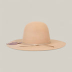 The 10x Belly - TC Hats is a brown Western hat featuring a brown ribbon and a shapeable crown.