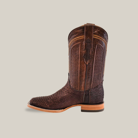 The Exotic Python - Matte Brown - Square Toe boot features a textured python skin-like pattern on its leather with a smooth wooden heel, showcased against a plain beige background.