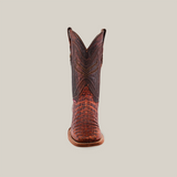 Front view of the handcrafted Exotic Caiman Horn Back boot, featuring a textured reptile-like pattern on the lower section resembling Caiman leather and intricate stitching on the upper shaft, set against a plain background.