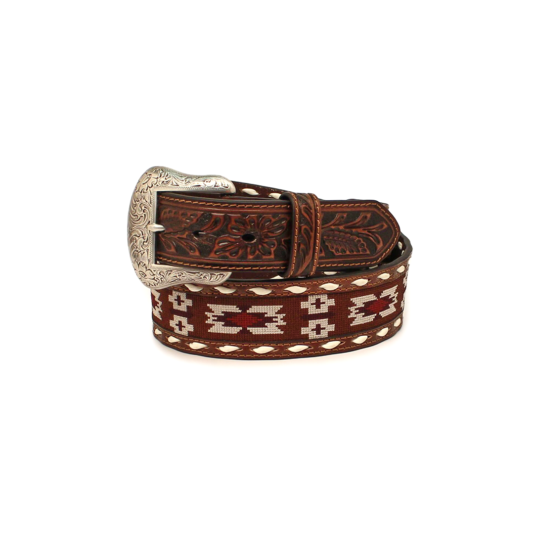 The Nocona Mens Belt, N210002702, is a brown leather accessory with an ornate silver buckle featuring engraved floral designs. It showcases sophisticated Aztec stitch and whipstitching patterns, exuding Western elegance.